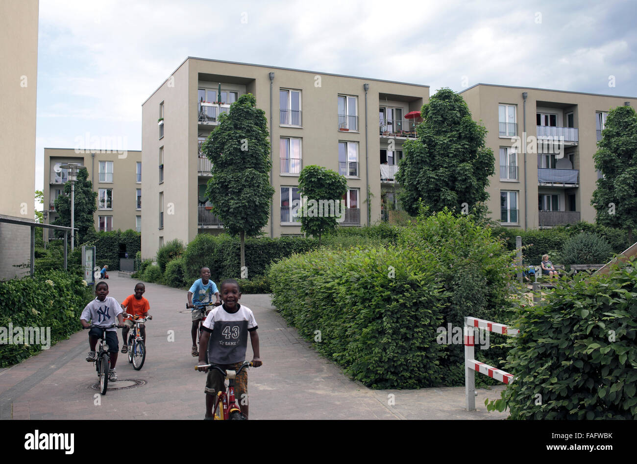 A pedestrian and bike route within the car-free settlement of Gartensiedlung Weissenburg, Muenster, Germany. Stock Photo