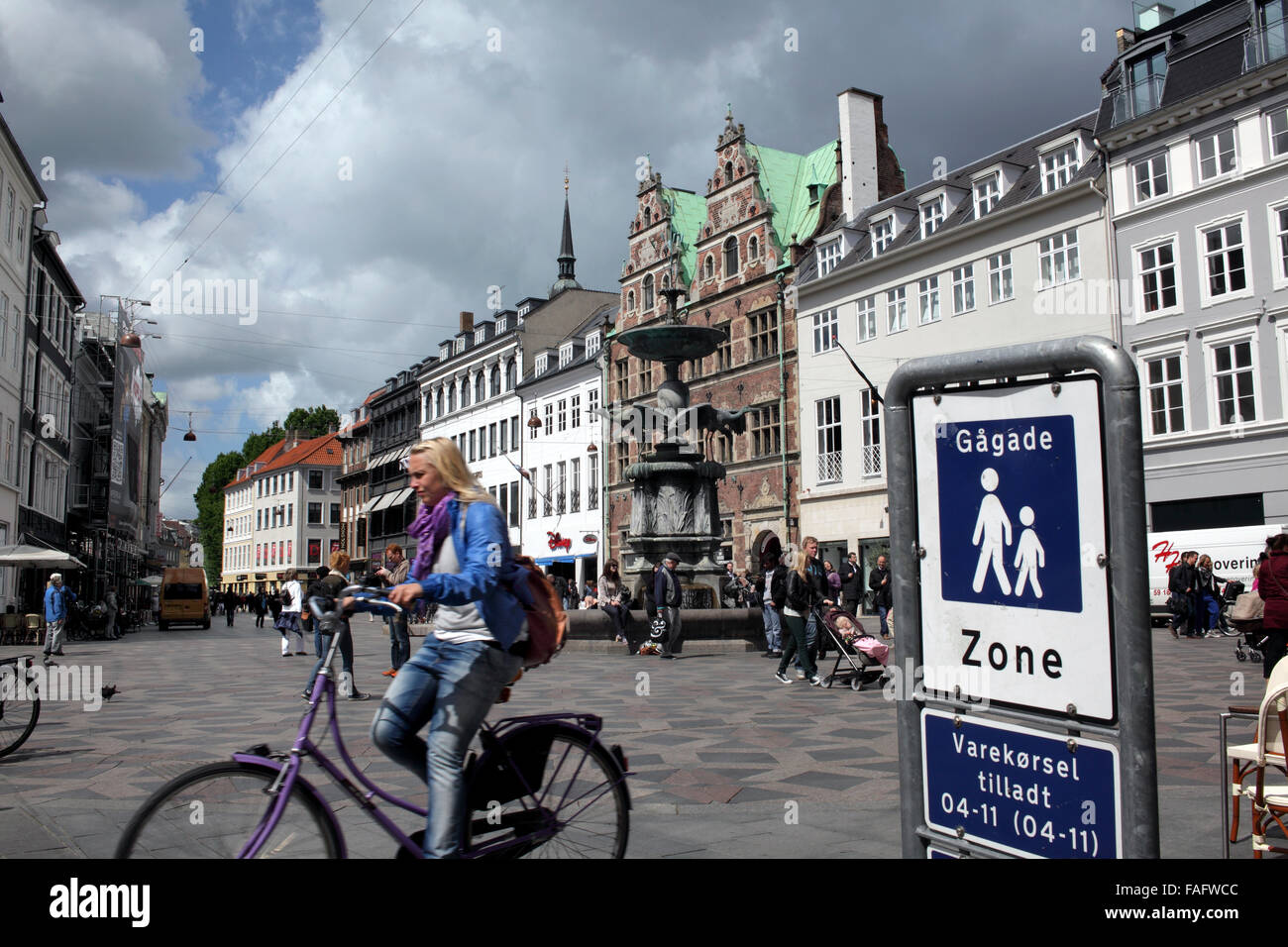 Pedestrian zone and cyclist in Amagertorv in the centre of Copenhagen, Denmark. Stock Photo