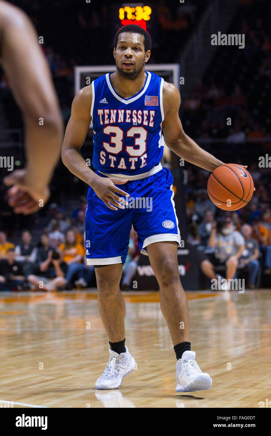 Knoxville, Tennessee, USA. 29th Dec, 2015. Wayne Martin #33 of the Tennessee State Tigers brings the ball up court during the NCAA basketball game between the University of Tennessee Volunteers and the Tennessee State University Tigers at Thompson Boling Arena in Knoxville TN  Credit:  Tim Gangloff/Cal Sport Media/Alamy Live News Stock Photo
