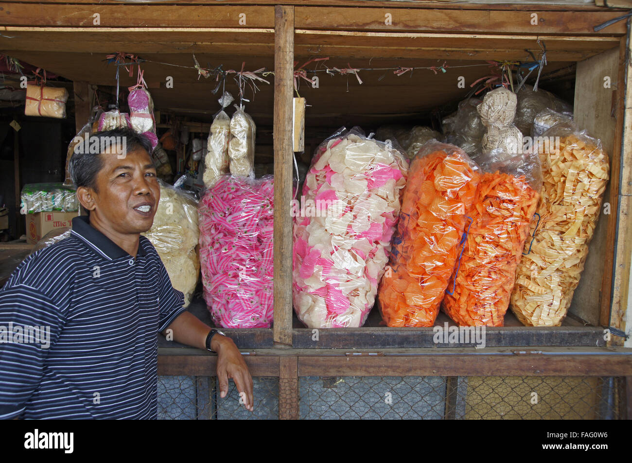 Market seller selling snacks Stock Photo - Alamy