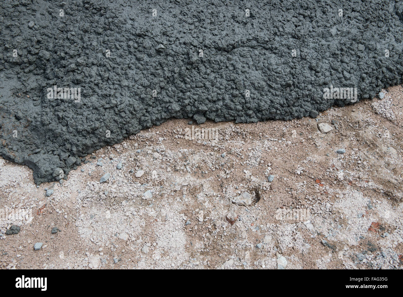 fresh cement just being poured for sidewalk upgrade Stock Photo - Alamy