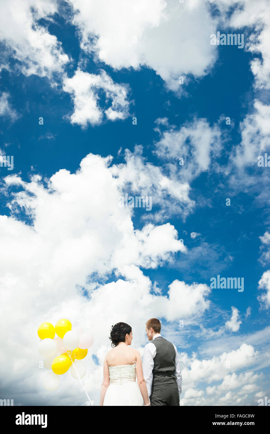 A young bride & groom on their wedding day Stock Photo - Alamy