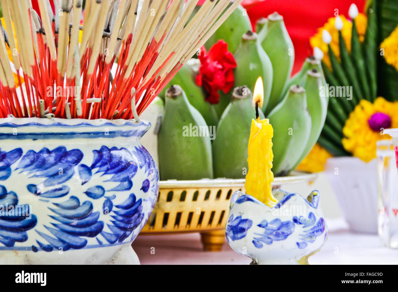 Incense pot and Candles burning Stock Photo Alamy