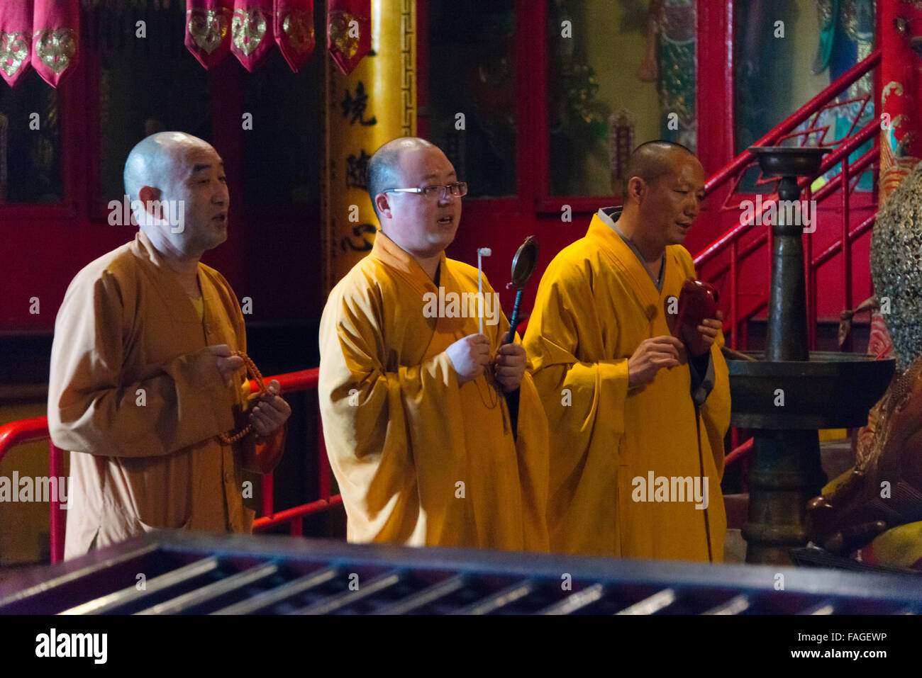 Monks peforming ceremony in Guangjiao Temple in Langshan Mountain, Nantong, Jiangsu Province, China Stock Photo