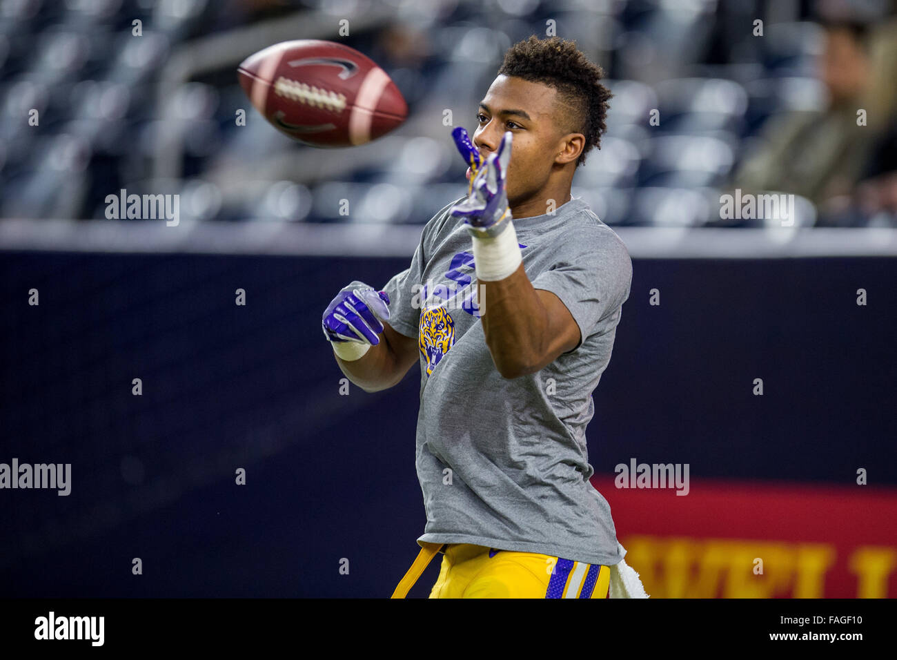 Houston, Texas, USA. 29th Dec, 2015. LSU Tigers wide receiver Malachi Dupre (15) warms up prior to the Advocare Texas Bowl NCAA football game between the LSU Tigers and the Texas Tech Red Raiders at NRG Stadium in Houston, TX on December 29th, 2015. Credit:  Trask Smith/ZUMA Wire/Alamy Live News Stock Photo