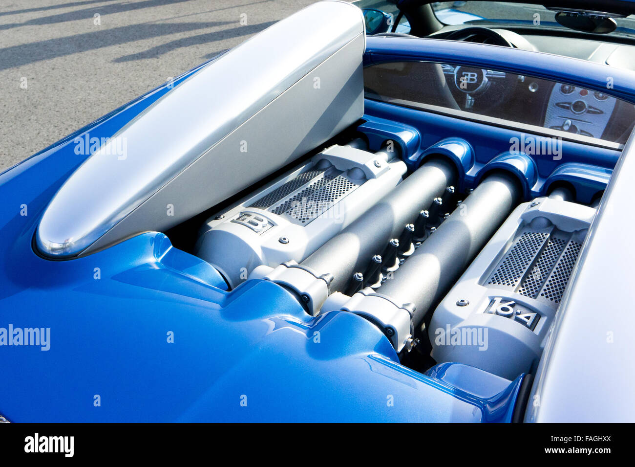 Blue Bugatti W16 engine on race track.This is very high power 1000ps engine. Stock Photo