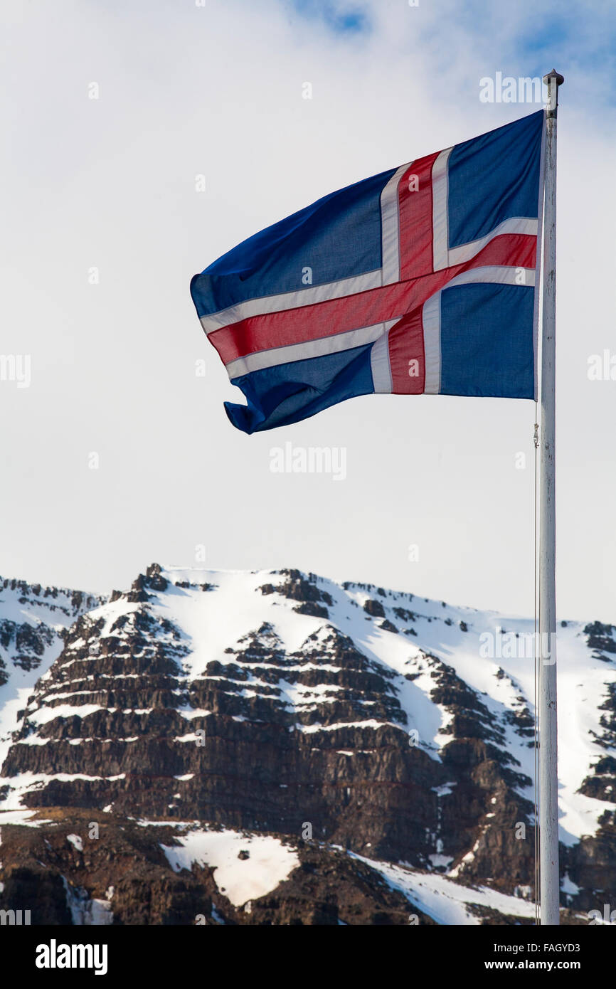 An Icelandic flag flies above the twon square in Isafjordur, the main
