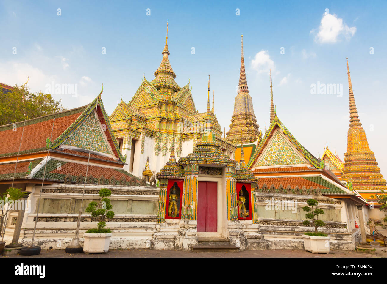 Pagodas of Wat Pho temple in Bangkok, Thailand Stock Photo - Alamy