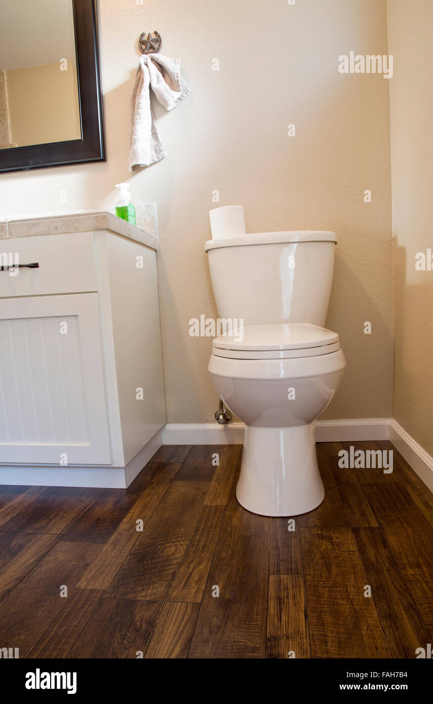 Modern new toilet installed in bathroom. Stock Photo