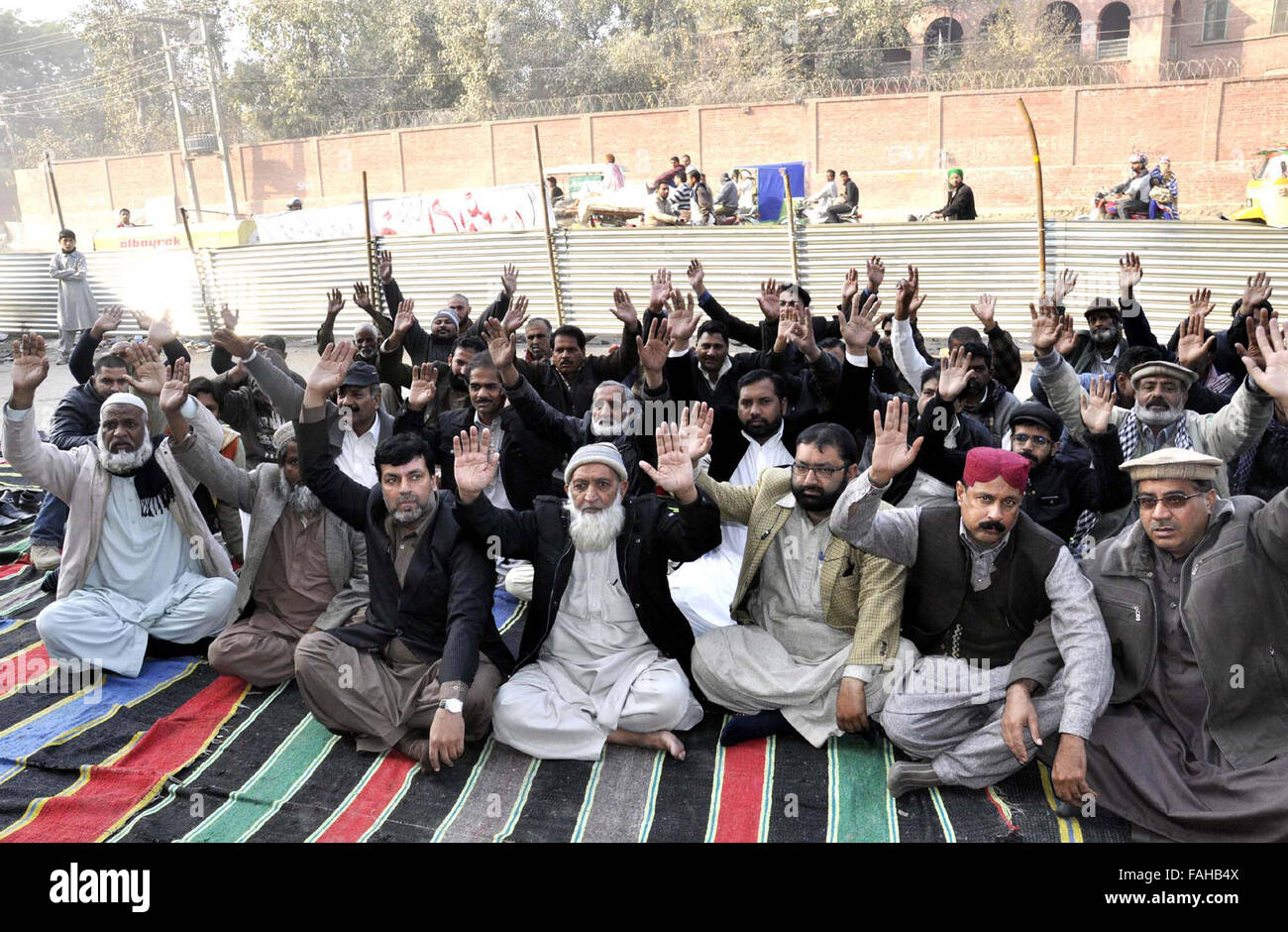 Members of Wapda Pegham Union chant slogans against privatization of Water and Power Development Authority during protest demonstration in Lahore on Wednesday, December 30, 2015. Stock Photo