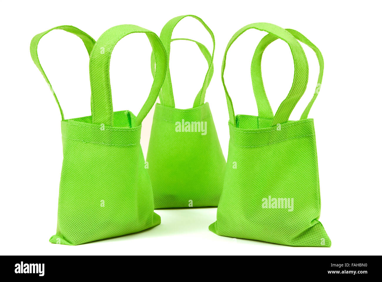 Green Neon Cloth Bags With Shadows Stock Photo