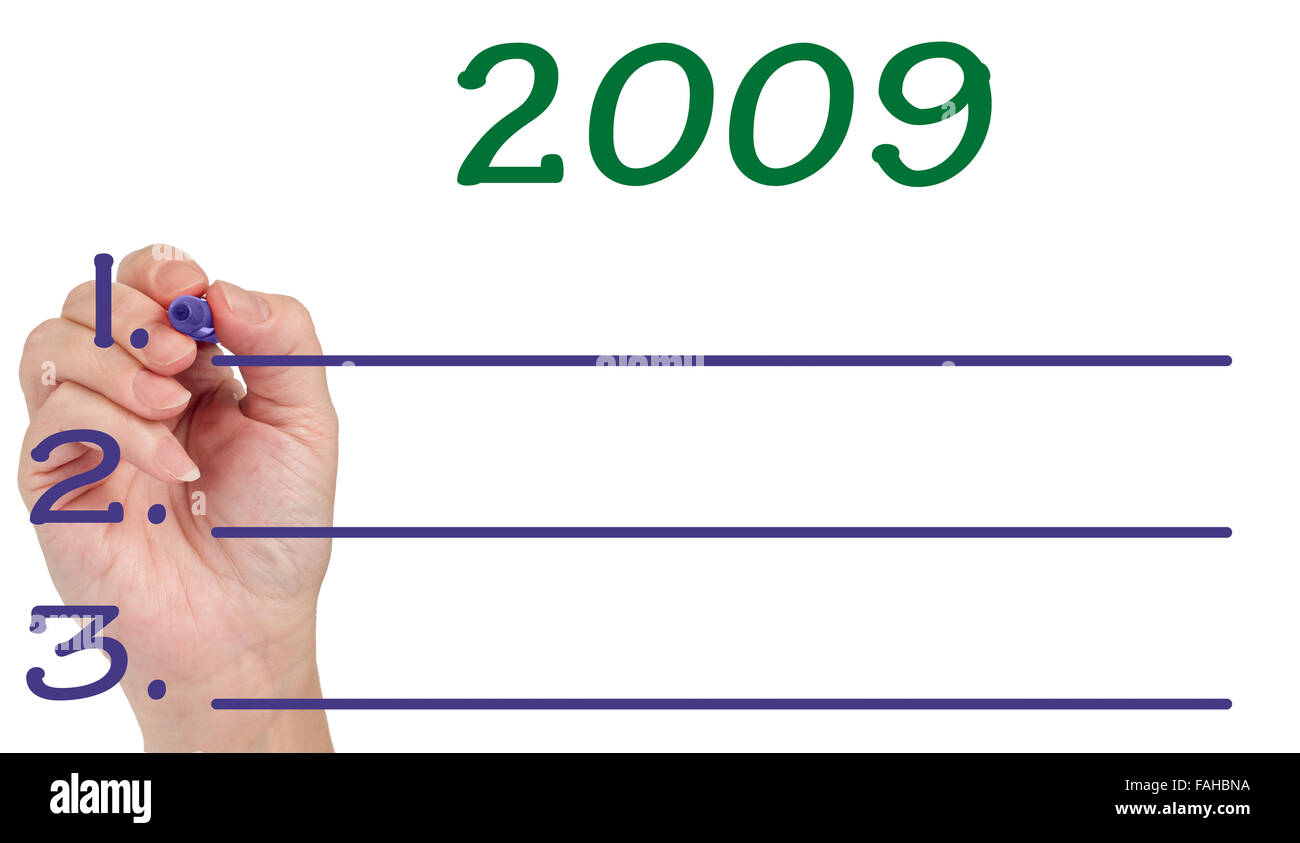 Hand Planning 2009 Goals on Whiteboard Stock Photo