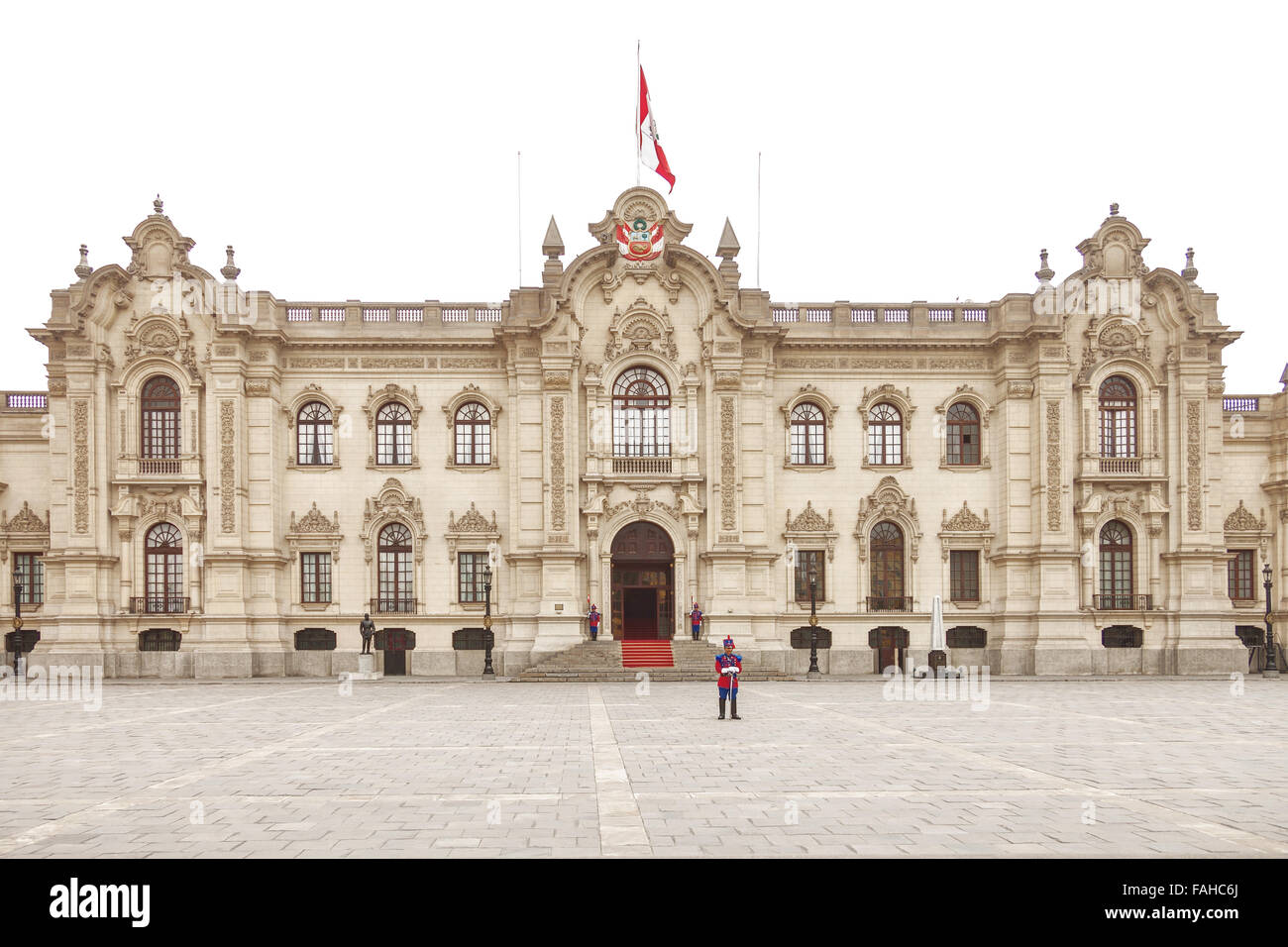 LIMA, PERU - OCTOBER 31, 2011: Government palace with guards at Plaza de Armas in Lima, Peru. It is the birthplace of the city o Stock Photo