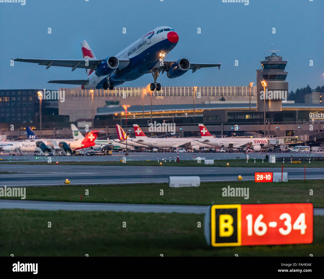 A passenger aircraft of British Airways is taking off runway 34 of