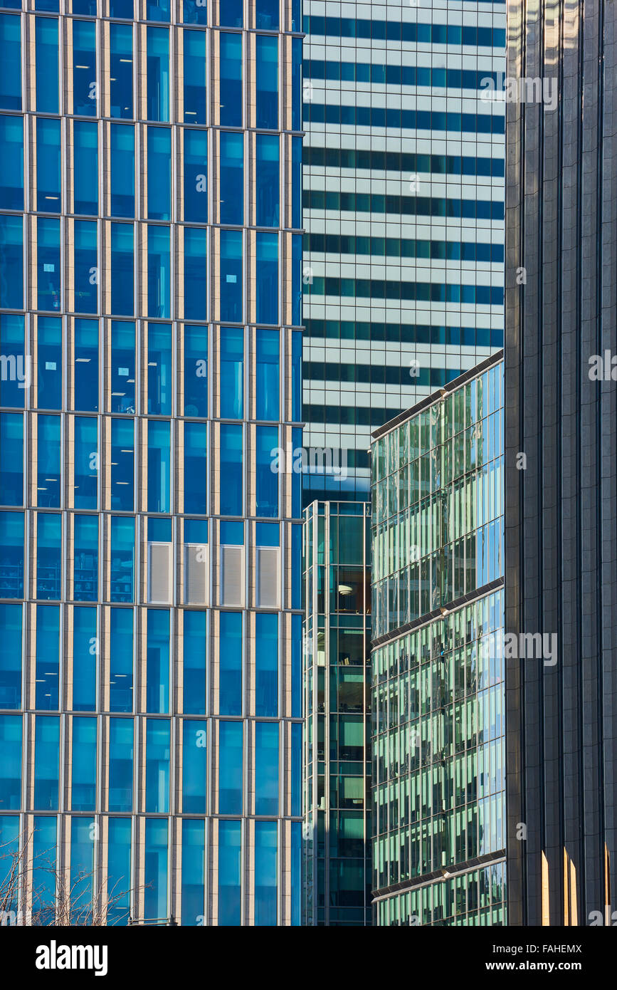 Close up cropped shot of skyscraper window frames in blue metal Stock