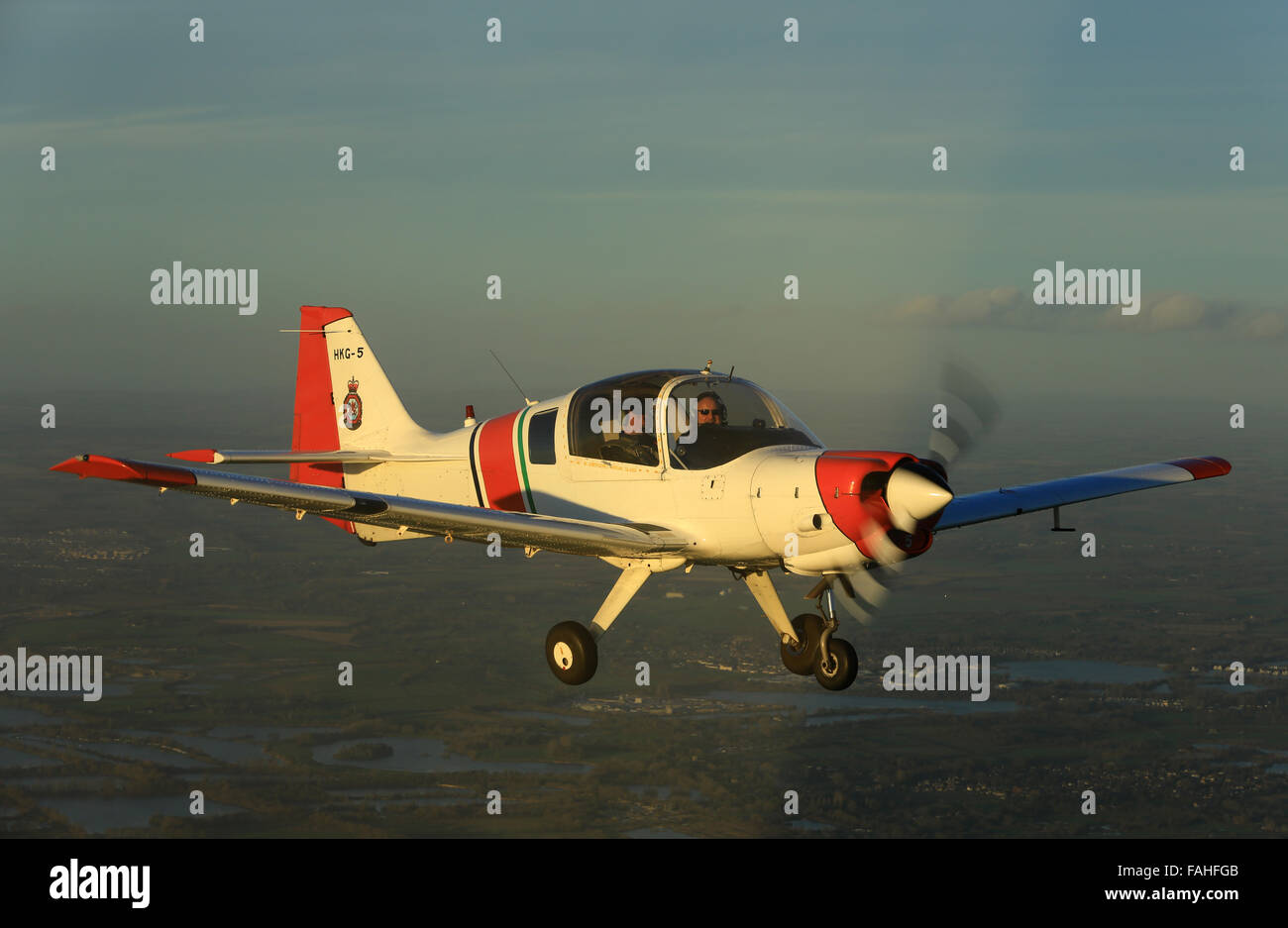 Formation flying images as we train with the former Royal Hong Kong Auxillary Air Force Bulldog being flown by a former RAF C.130 Hercules instructor. Stock Photo