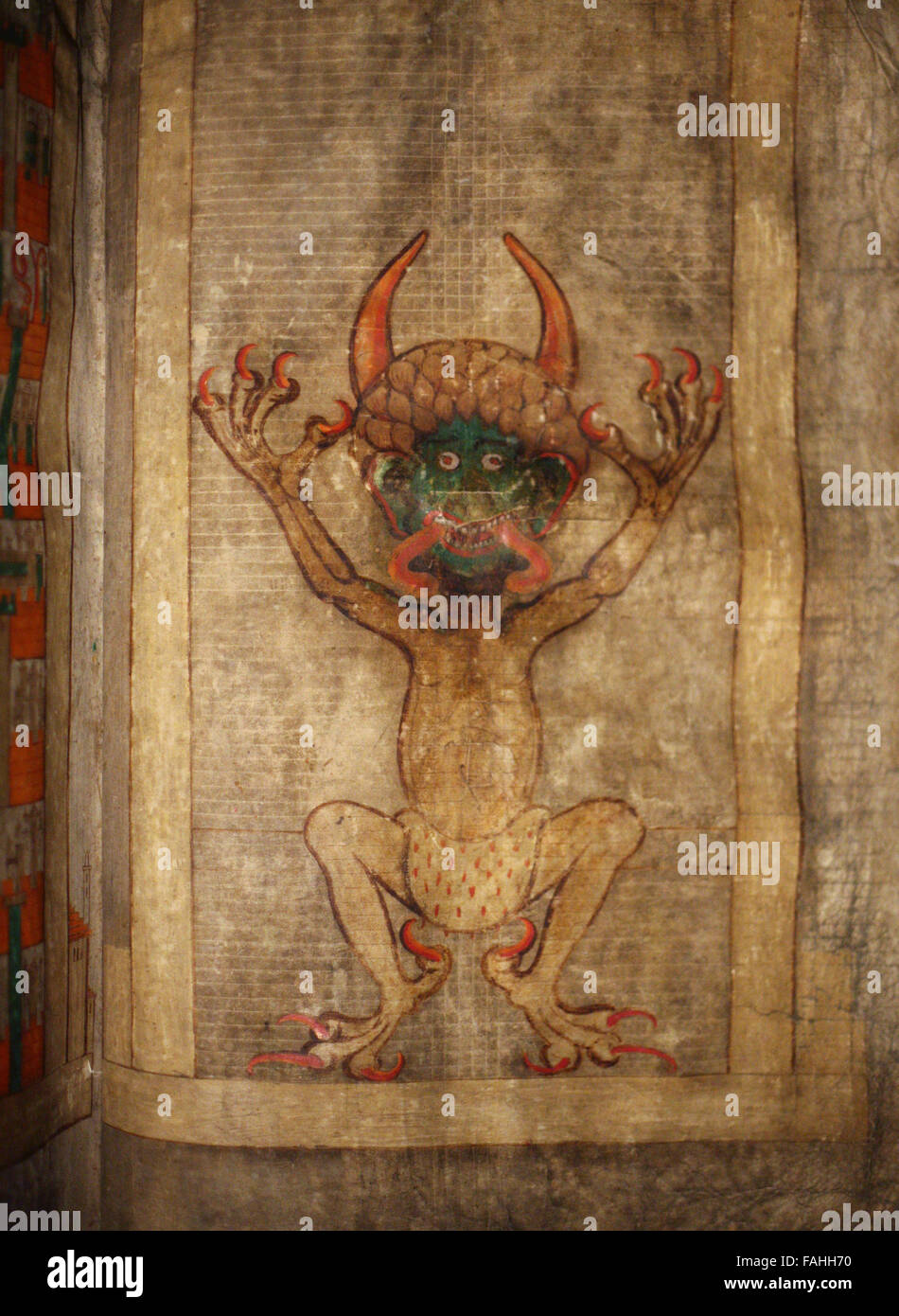 The devil depicted in the largest medieval manuscript in the world known as the Codex Gigas or also as the Devil's Bible displayed at the exhibition 'The Codex Gigas: the mystery of the largest book in the world' in the Czech National Library in Prague, Czech Republic, on September 19, 2007. The Codex Gigas was created in the early 12th century in the Benedictine monastery of Podlazice in Bohemia, now in the Czech Republic. It is known as the Devil's Bible because of a large illustration of the devil on the inside. At the end of the Thirty Years War in 1648 the manuscript was taken as war boot Stock Photo