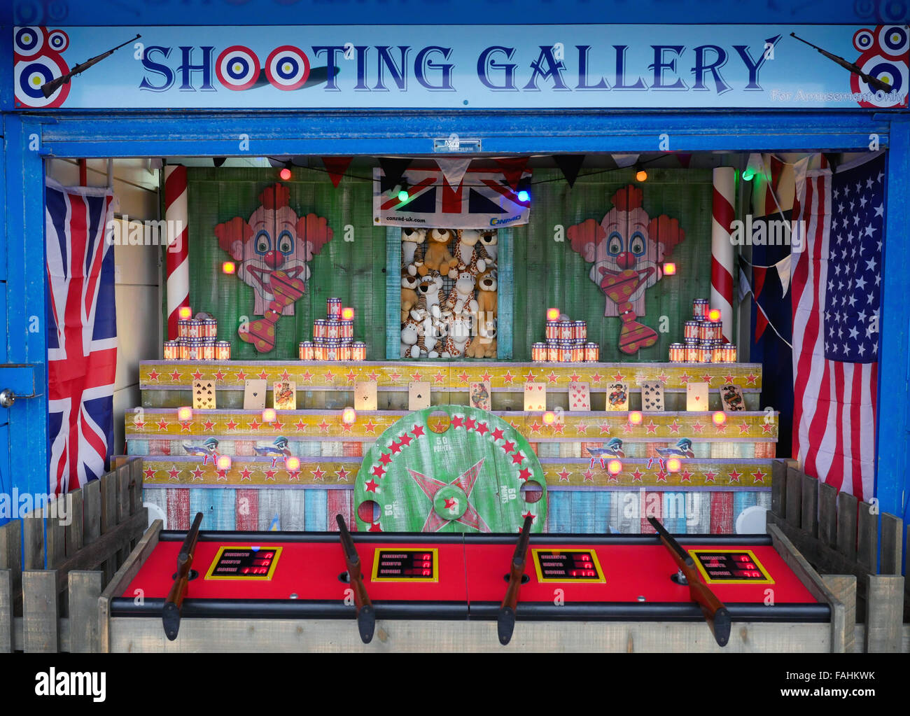 Shooting gallery at fairground Stock Photo