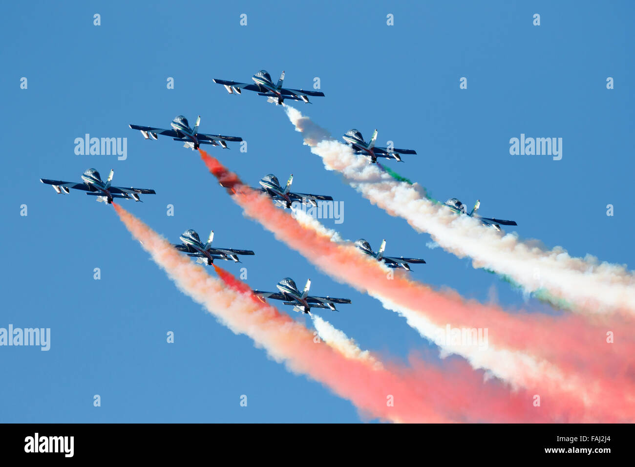 Italian special unit airforce 'Frecce Tricolori' (Tri-colour Arrows) spread smoke with the colours of the Italian flag Stock Photo