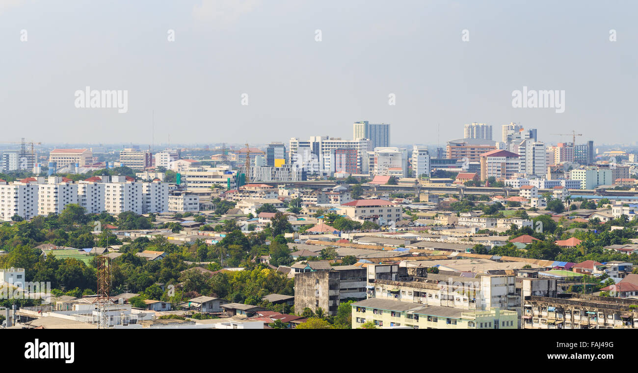 Panorama view from high building on Bangkok city. There is tree grow in ...