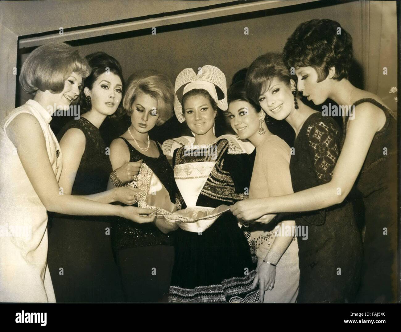 1963 - Off for Elegance festival; Six ''Misses'' have been inlisted by the French Elegance committee to represent France at the elegance festival to be held in Germany. Photo Shows Surrounding a girl in Breton costume are from left to right; Miss Finland, Miss Iceland, Miss Germany, Miss England, Miss Sweden and Brigitte Pradel. © Keystone Pictures USA/ZUMAPRESS.com/Alamy Live News Stock Photo