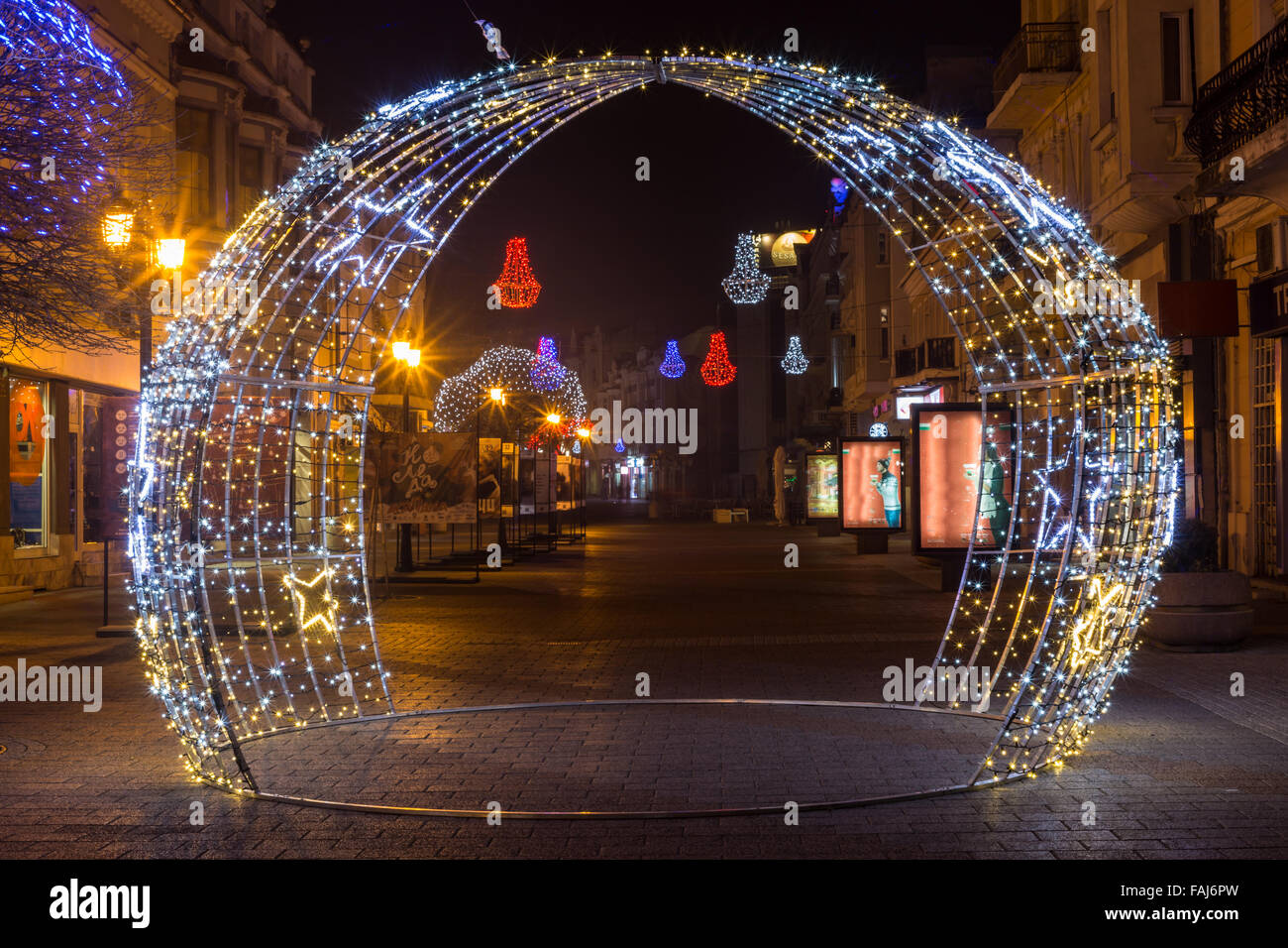 Christmas lights shaped as beautiful arch Stock Photo - Alamy