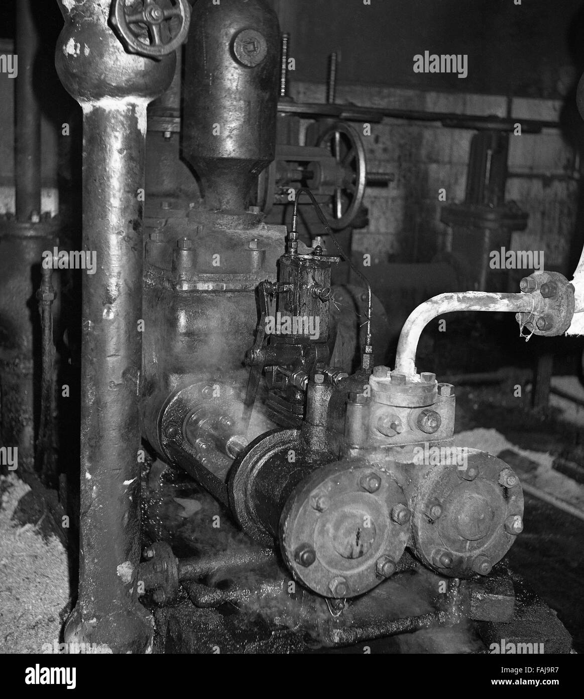 Steam tar pump on coke oven plant. Stock Photo