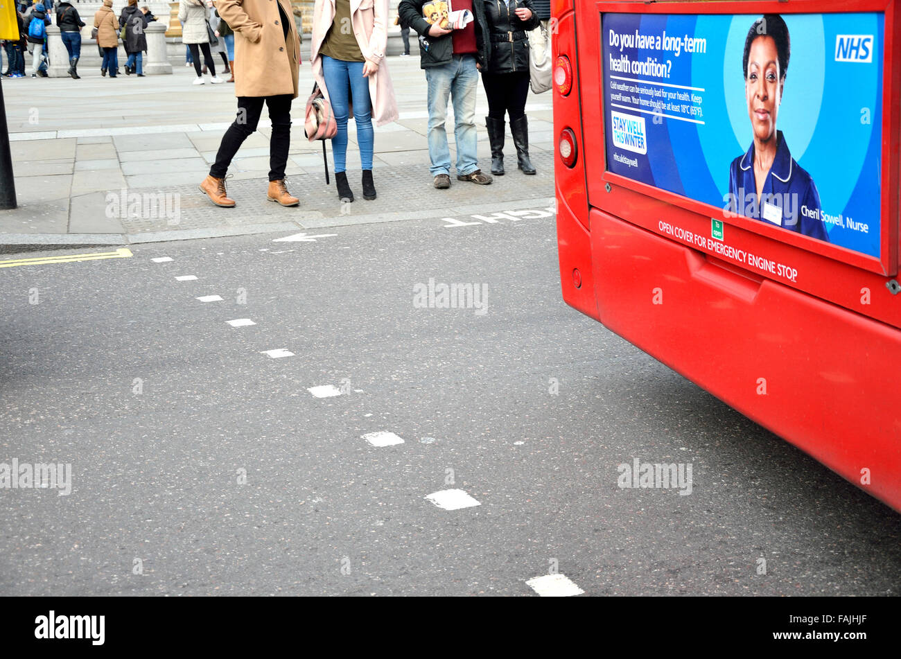 London, England, UK. NHS Stay Well This Winter campaign advert on the back of a bus Stock Photo