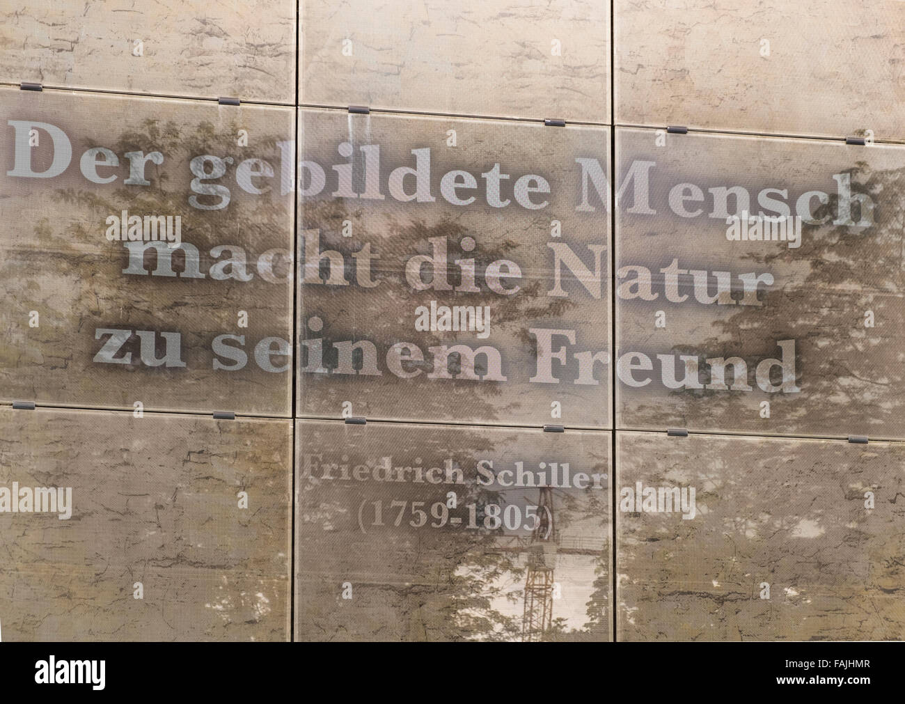 square of glass plates at the city wall displays a quote by geman poet friedrich schiller: the educated man makes nature his fri Stock Photo