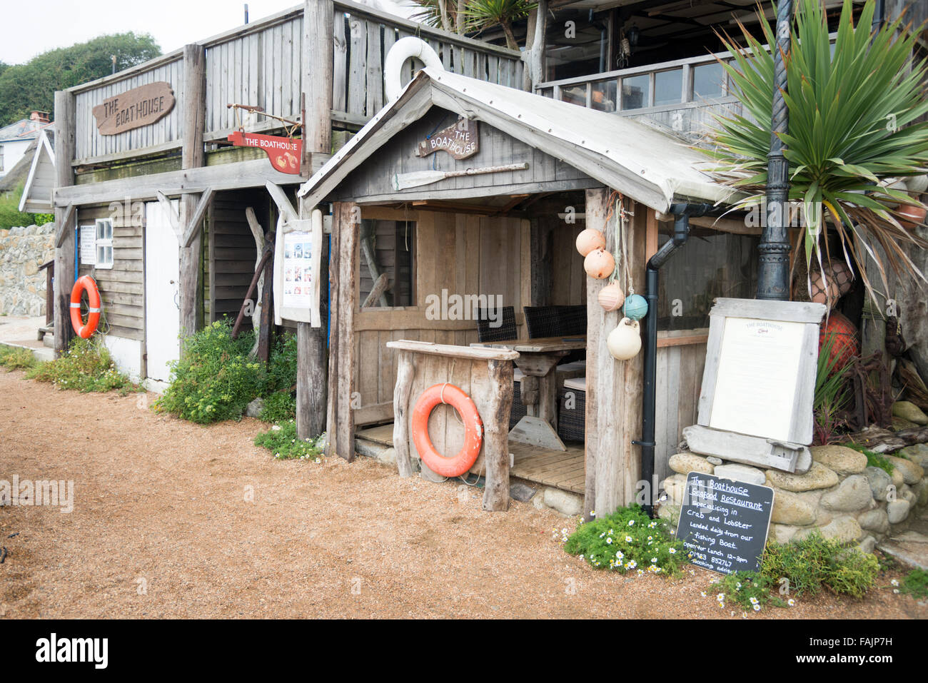A small beach shack or shed cafe on the beach at Steephill Cove Isle of Wight UK Stock Photo