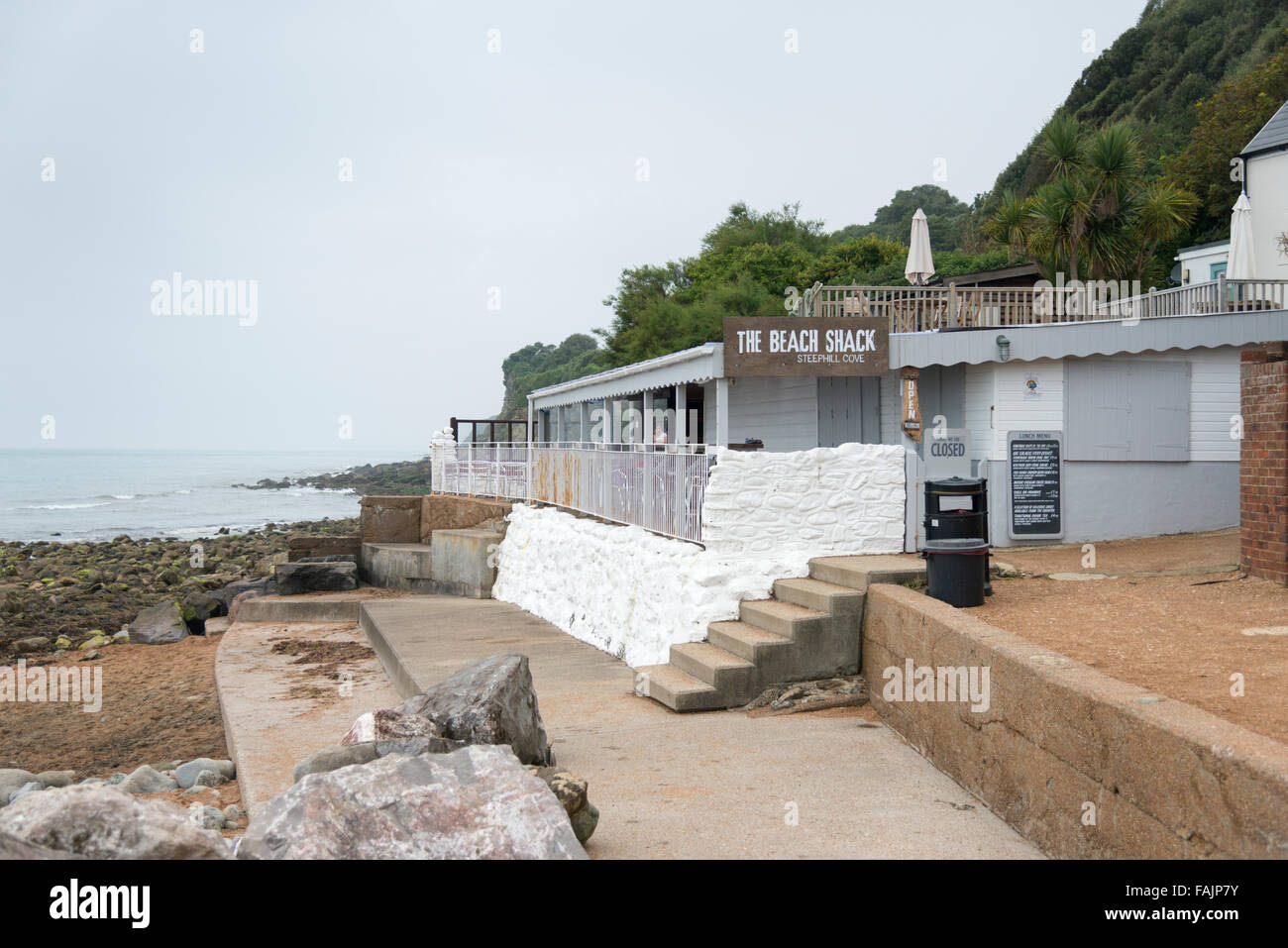 A small beach shack or shed cafe on the beach at Steephill Cove Isle of Wight UK Stock Photo
