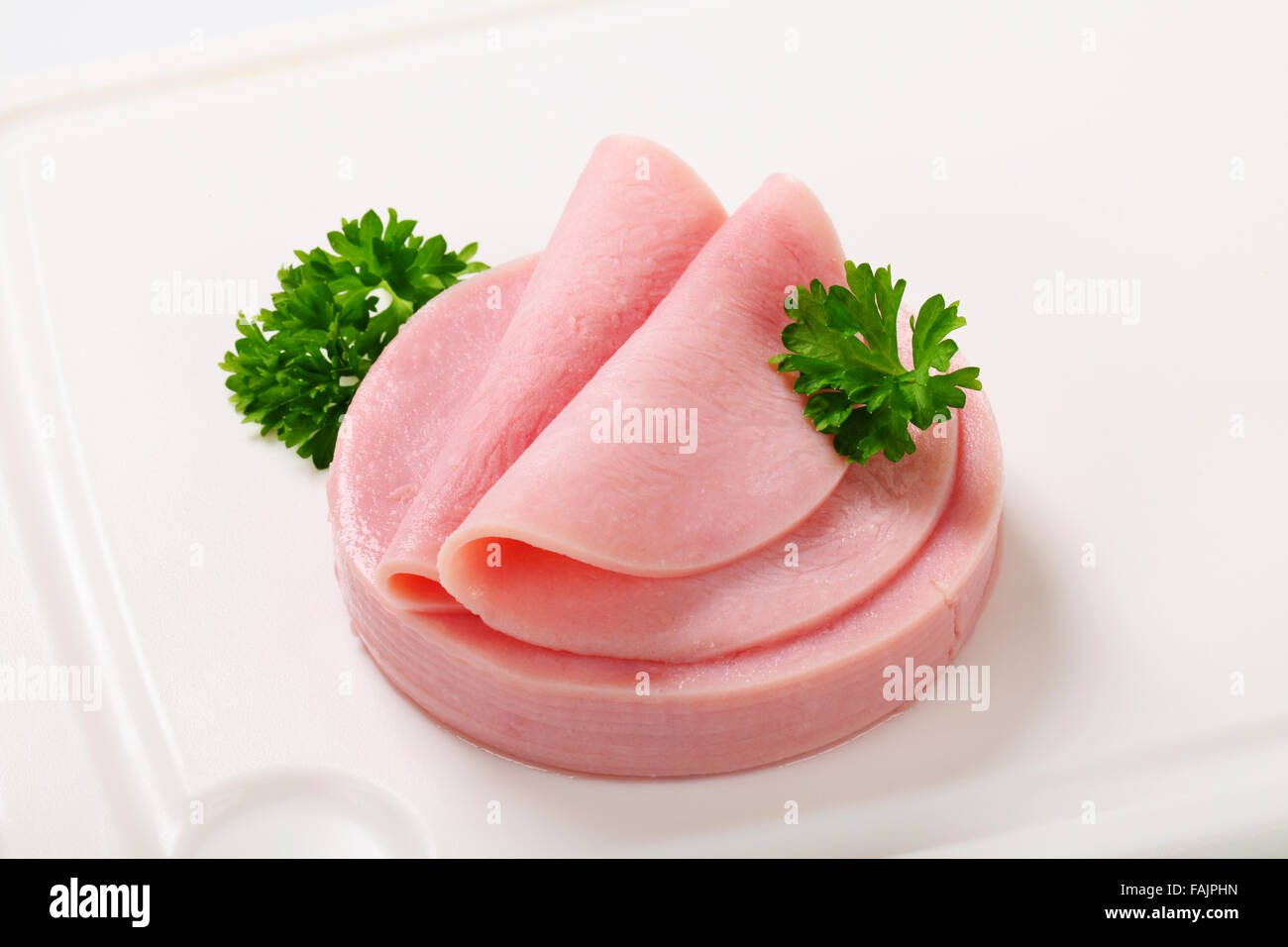 Thin slices of lean ham Stock Photo Alamy