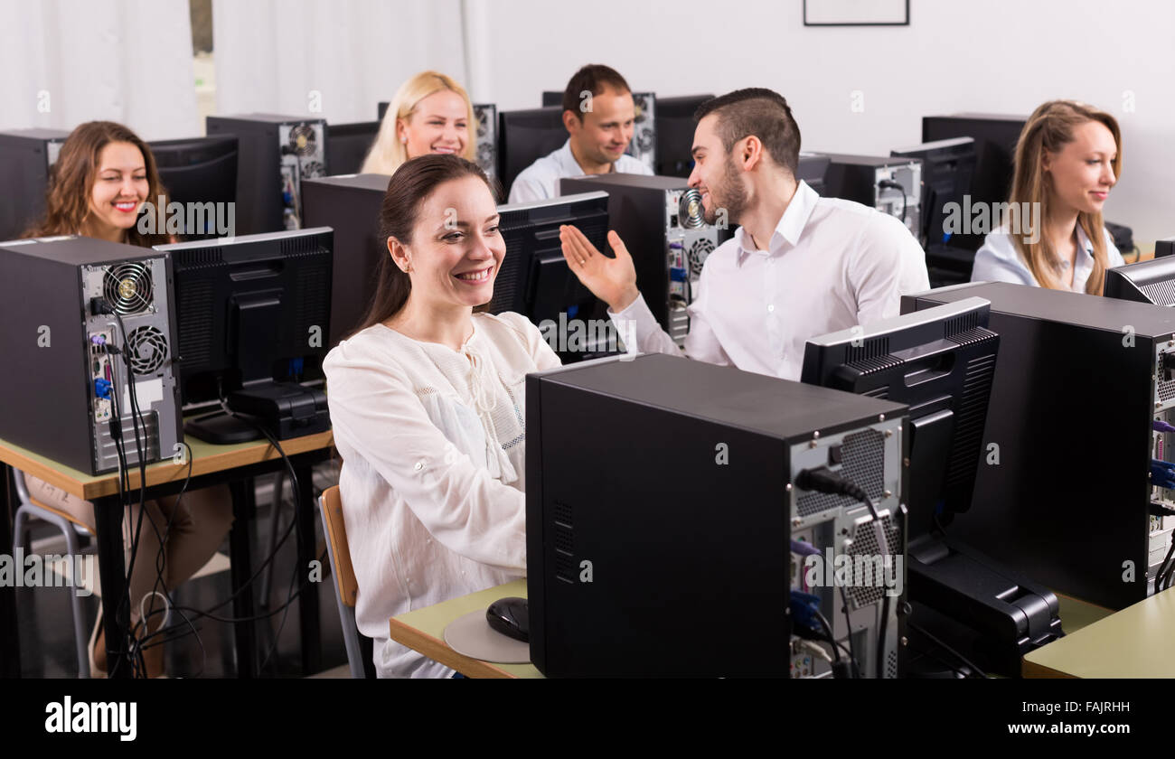 Modern office with satisfied colleagues Stock Photo