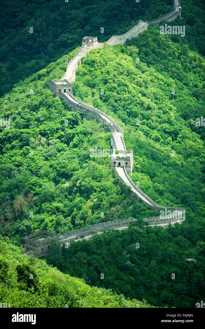 the great wall of china winding through the hills Stock Photo Alamy