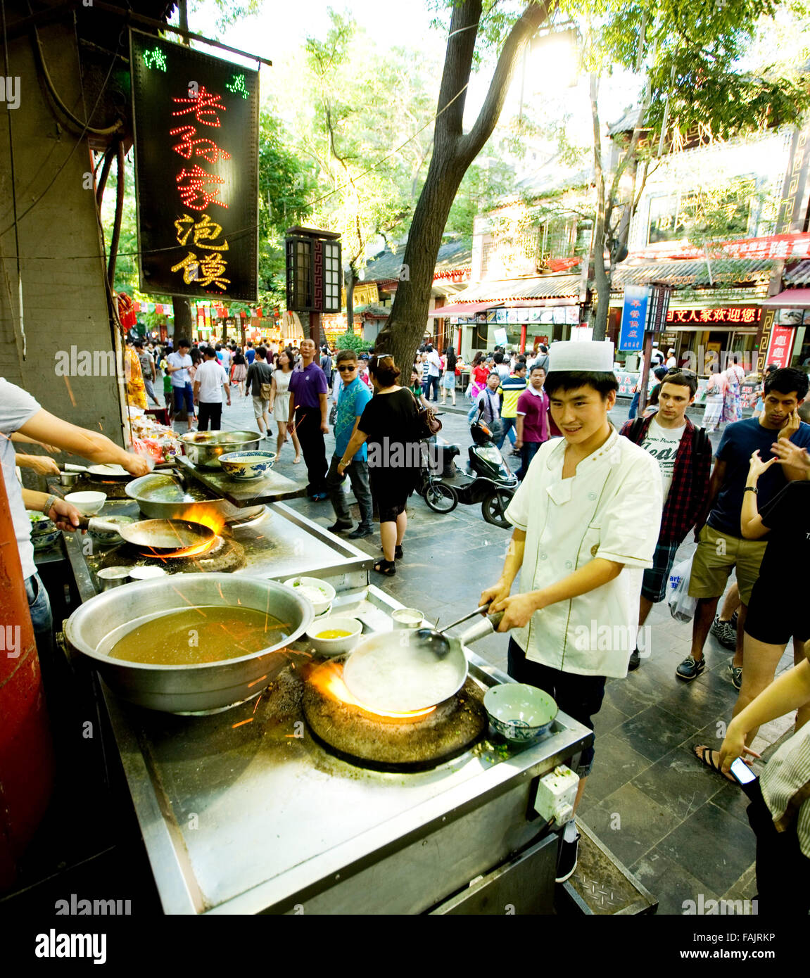 Muslim chef cook South East Asian street dishfood Stock Photo
