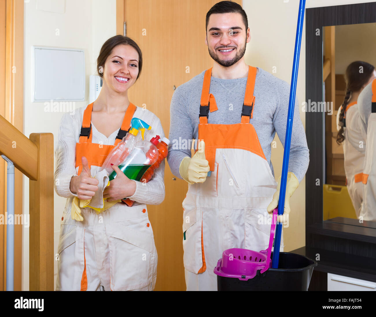 Professional workers cleaning in room Stock Photo Alamy