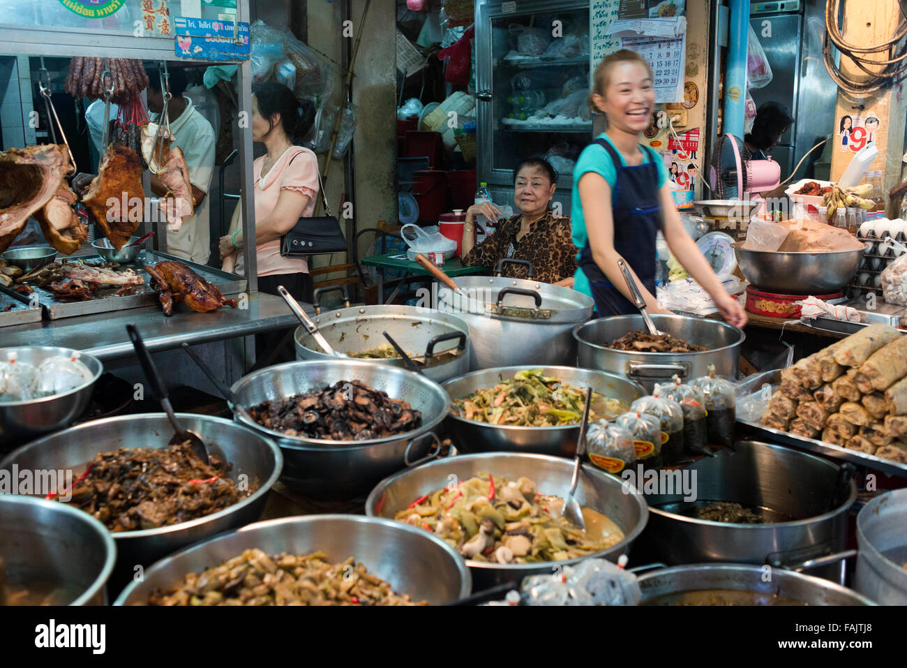 Market stall and street food being prepared in Chinatown Bangkok, Thailand. Yaowarat market