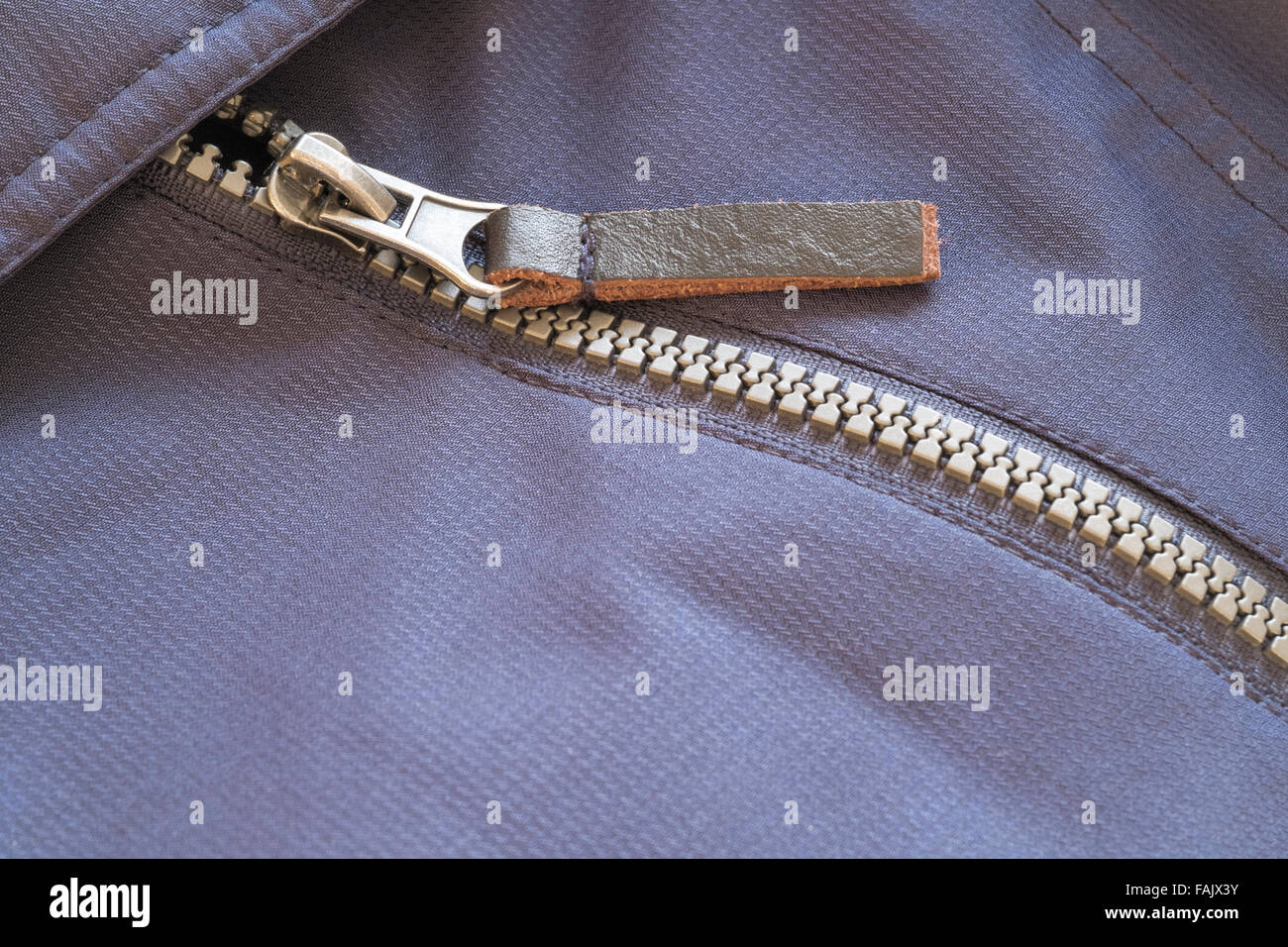 Close up of zipper on waterproof jacket. Stock Photo