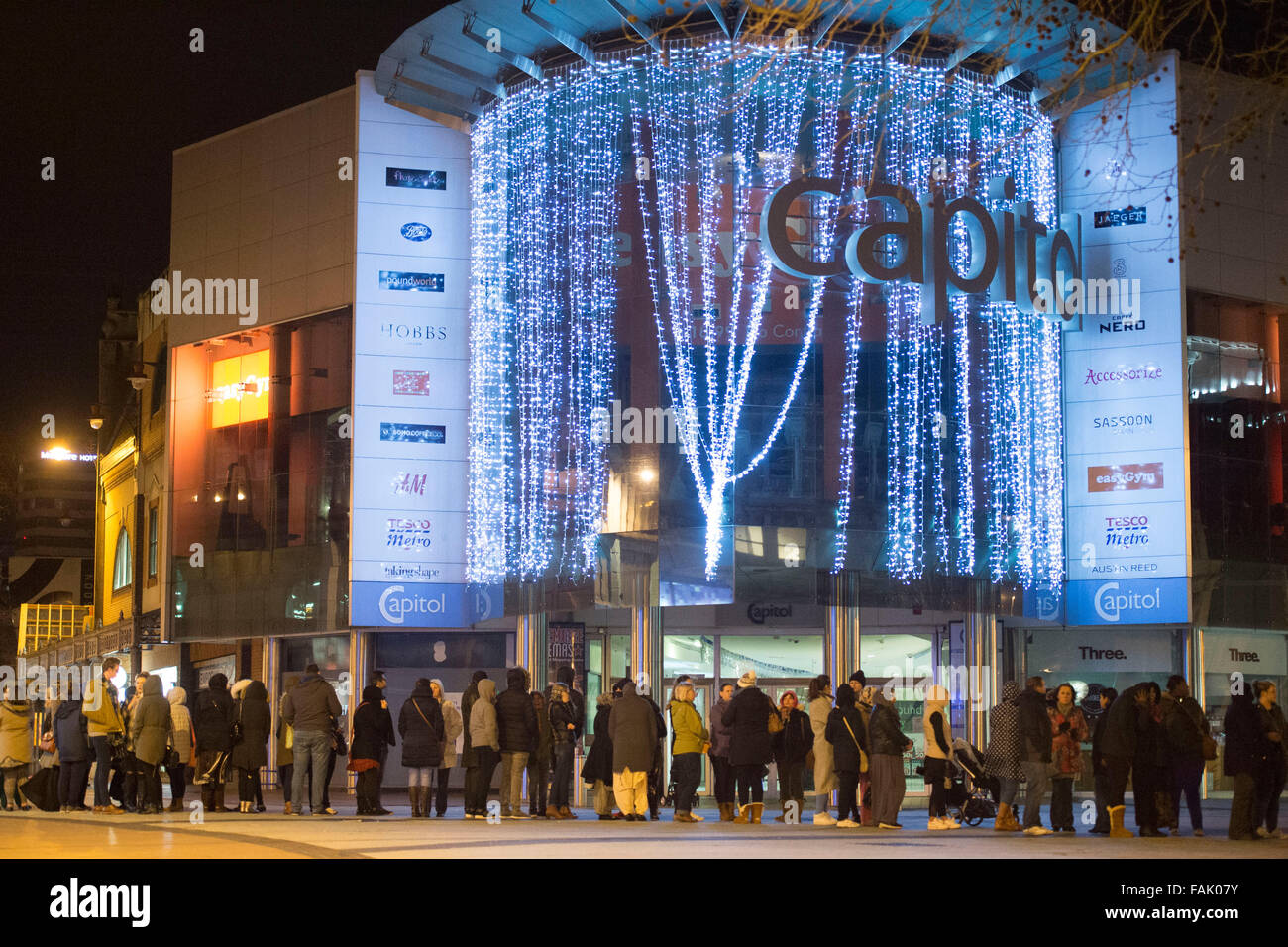 Shoppers queue from 2am for the Next Boxing Day Christmas sales in Cardiff, South Wales. Stock Photo