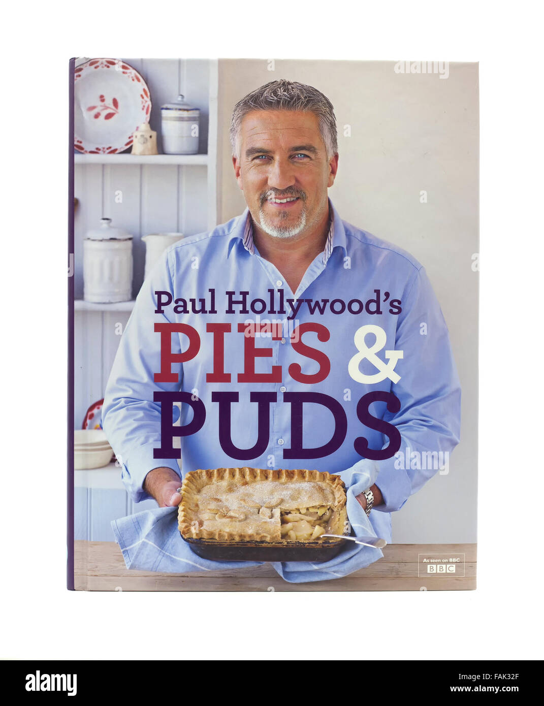 Paul Hollywood's Pies and Puds Cook Book on a White Background, Paul Hollywood is an English baker and celebrity chef Stock Photo