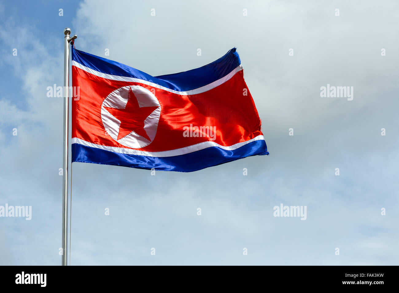 North Korea flag blowing in the wind Stock Photo