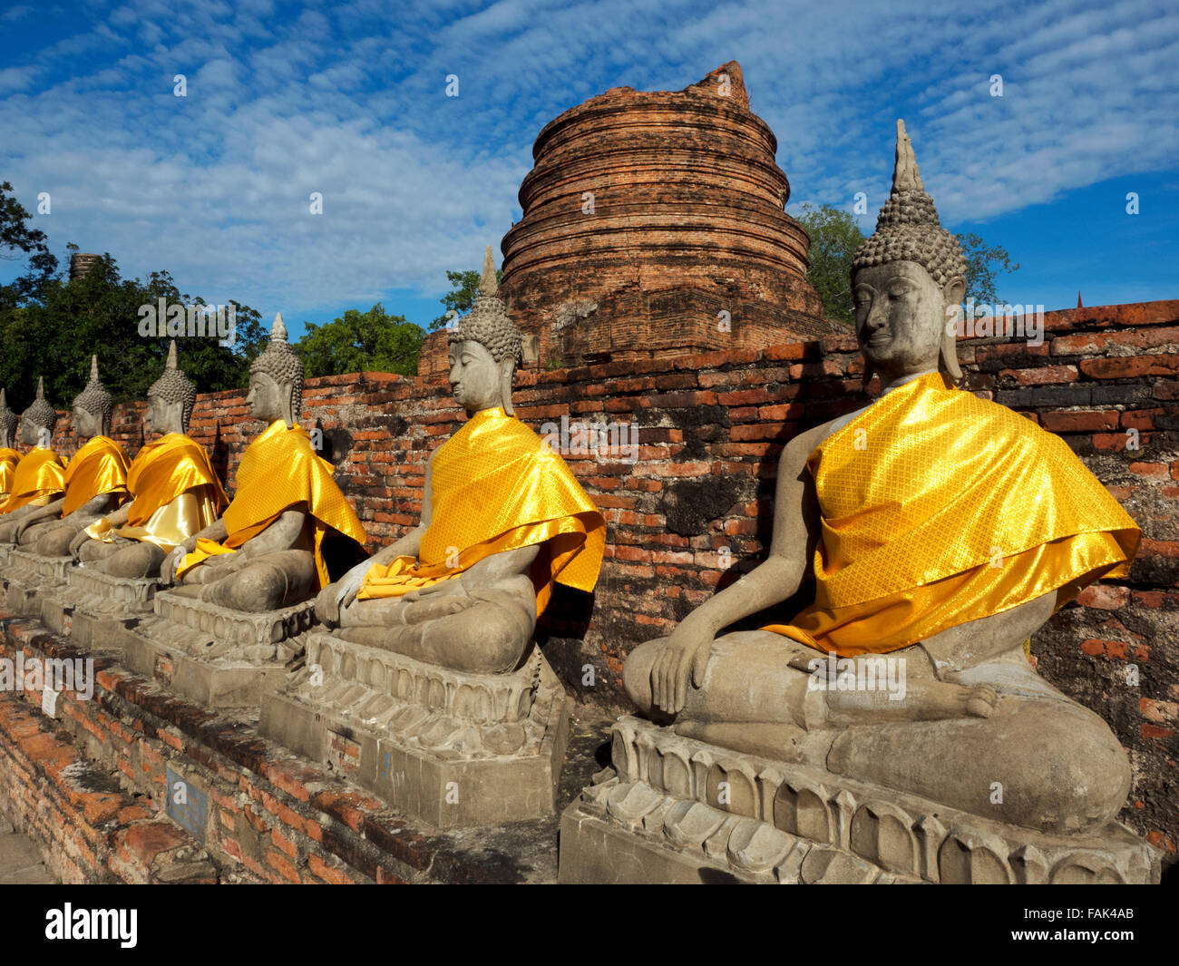 Buddha statues in front of the Central Stupa, Wat Yai Chai Mongkhon, Thailand, Asia Stock Photo