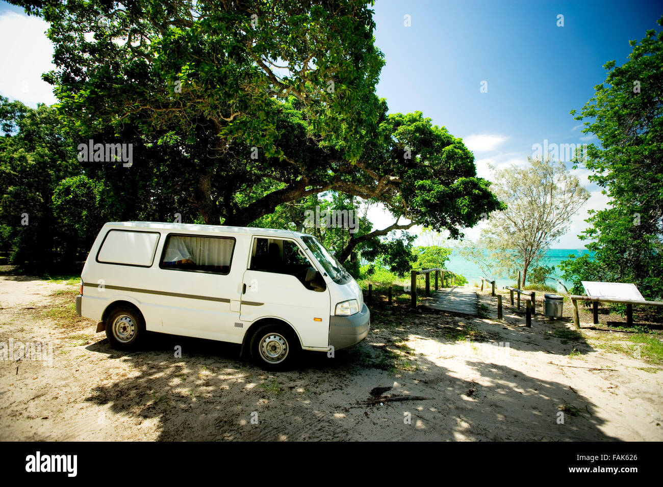 camper van parked next to a beach in Australia Stock Photo