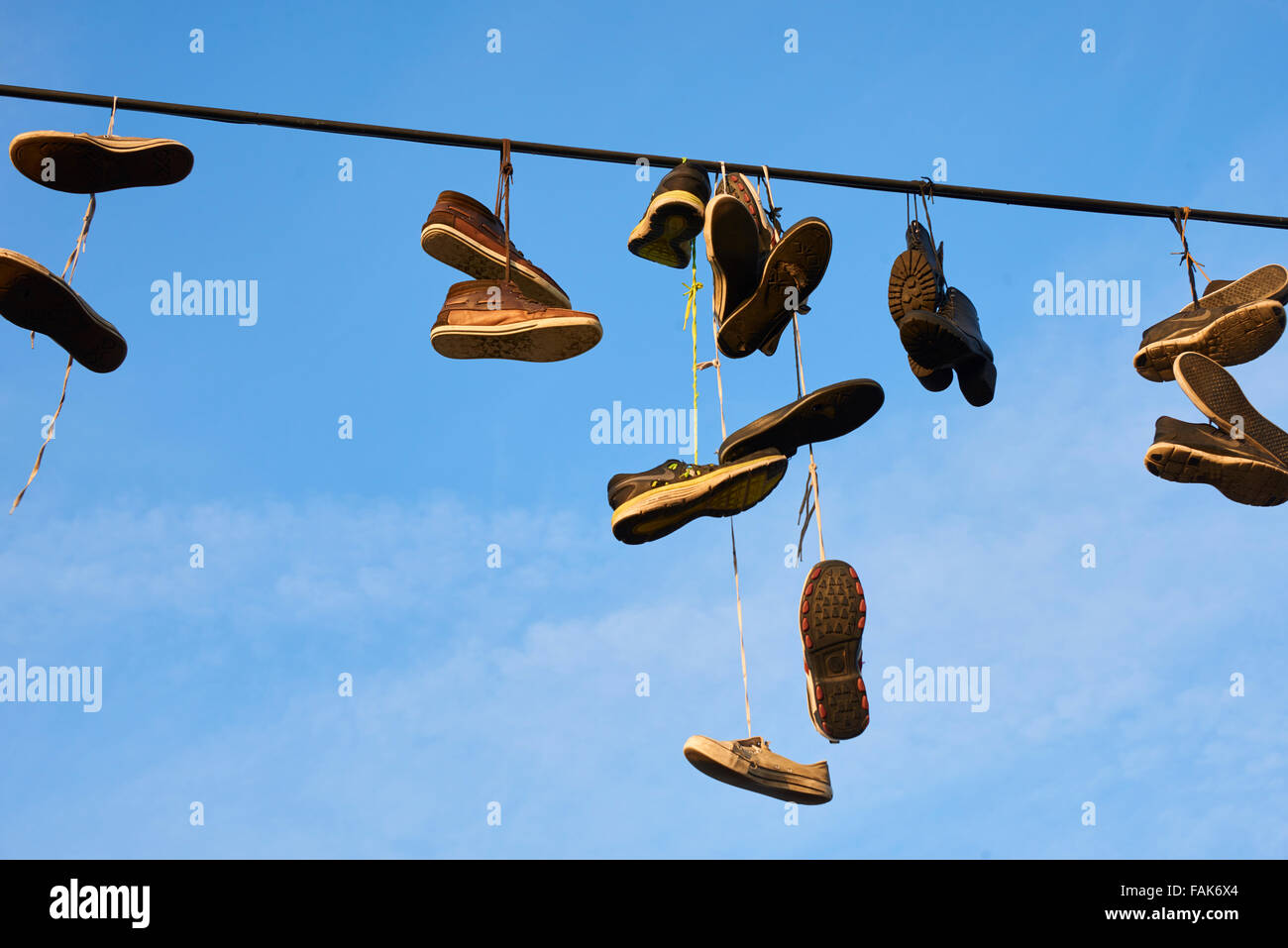 Shoes Hanging from Wire Stock Photo Alamy