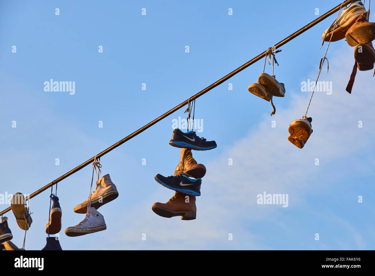 Shoes Hanging from Wire Stock Photo Alamy