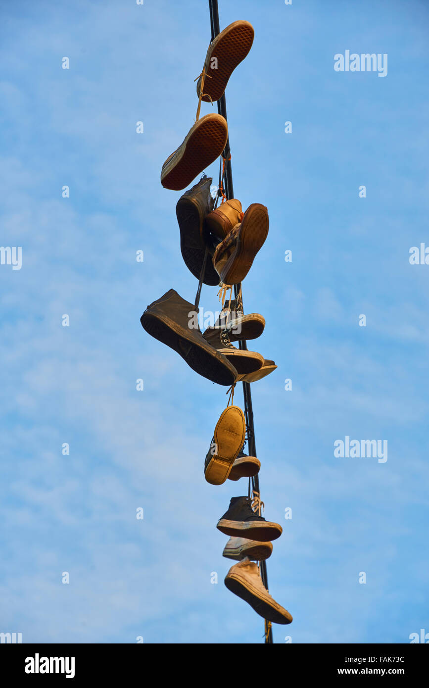 Shoes Hanging from Wire Stock Photo Alamy