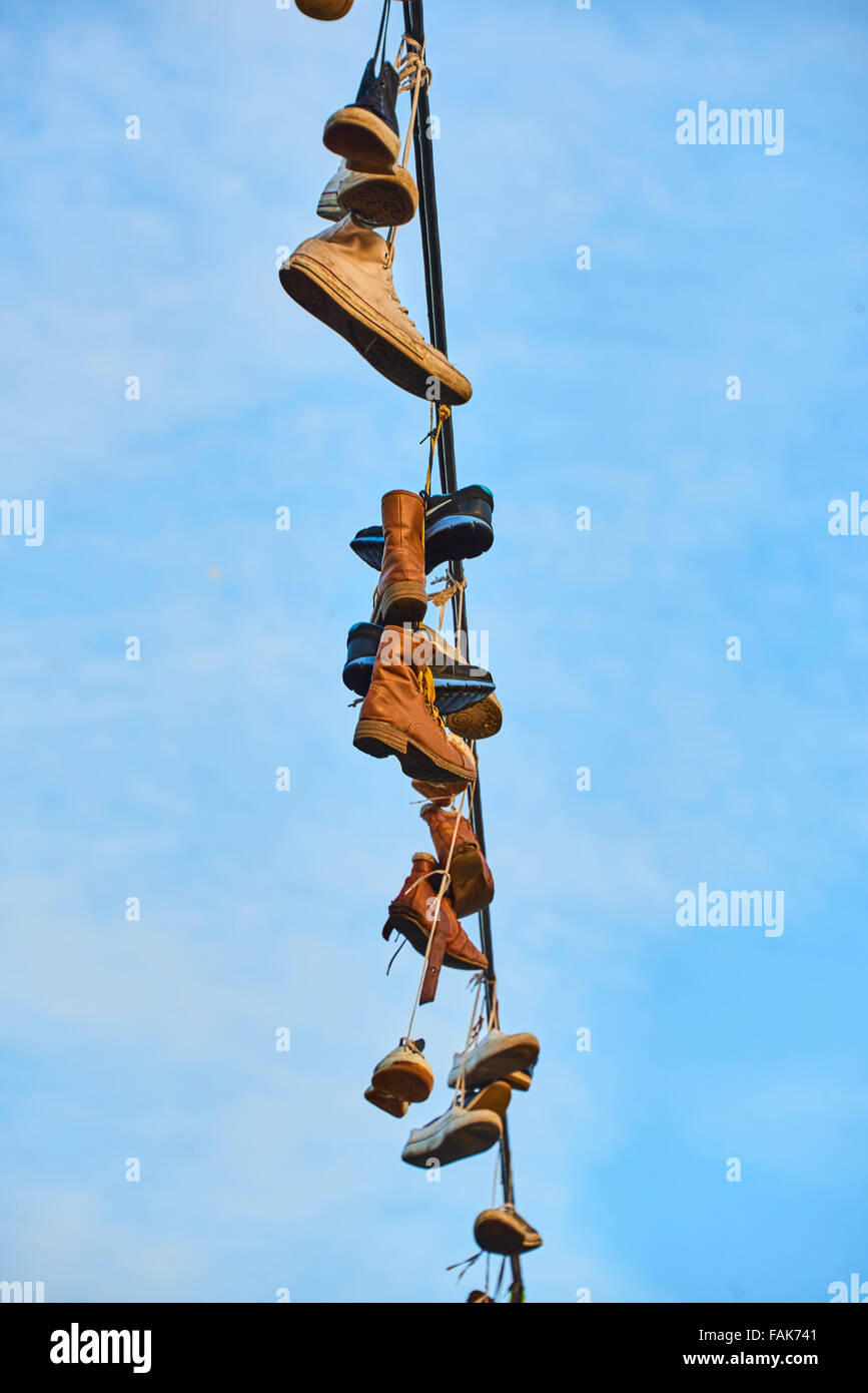 Shoes Hanging from Wire Stock Photo Alamy