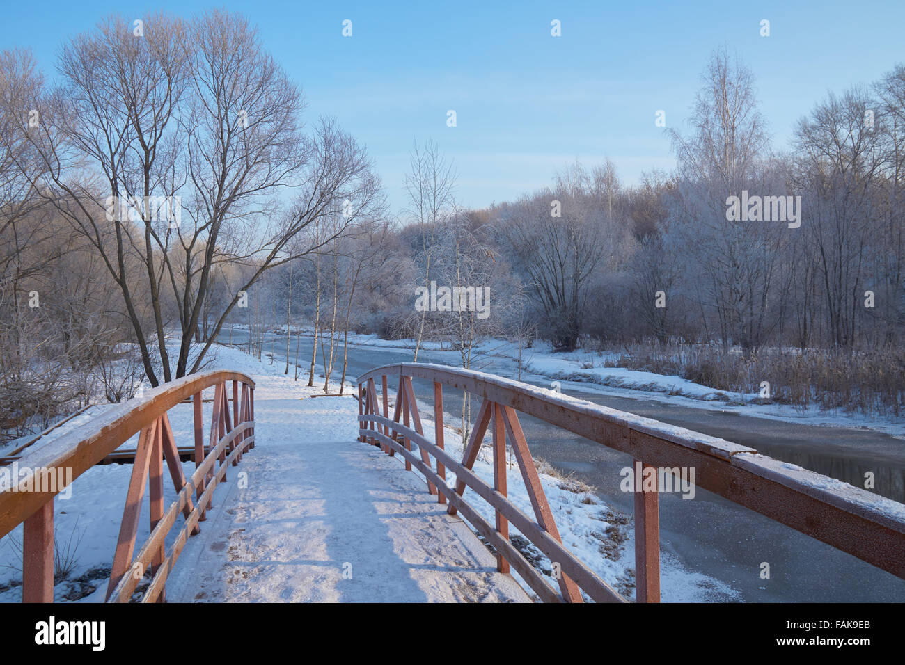 Winter view on the river and park from wooden bridge Stock Photo