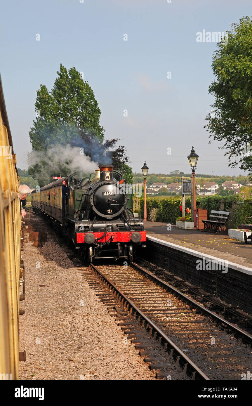 Steam train approaching Williton Station on the West Somerset Steam