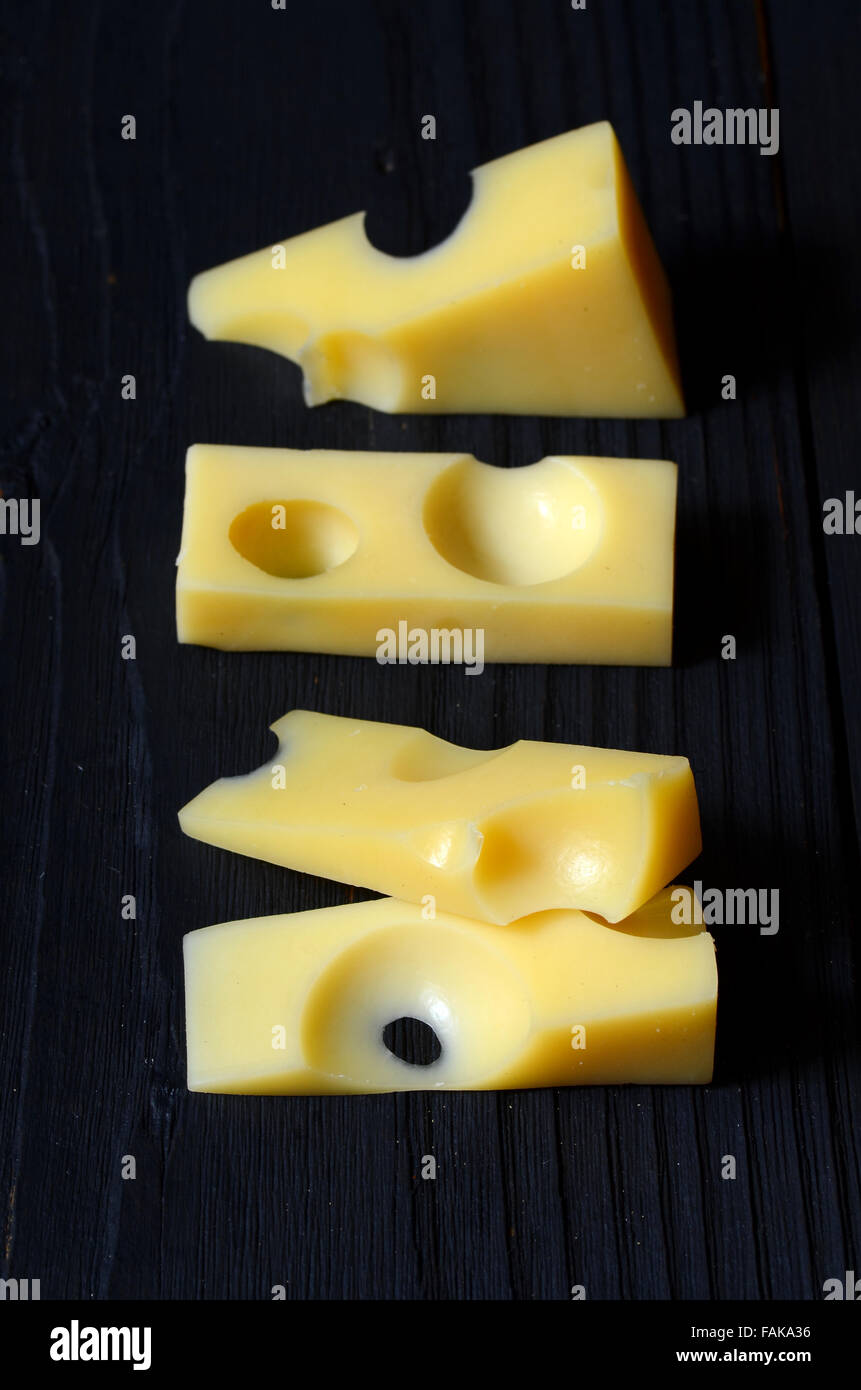 pieces and slices of fresh emmental cheese Stock Photo Alamy